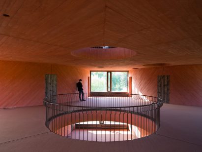 Circular voids in INES innovation centre by Pezo von Ellrichshausen