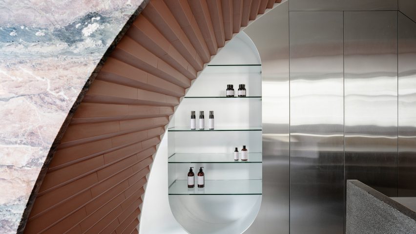 Marble arch and steel shelving in Dublin skin clinic Fitzgerald Private Clinic by Kingston Lafferty Design