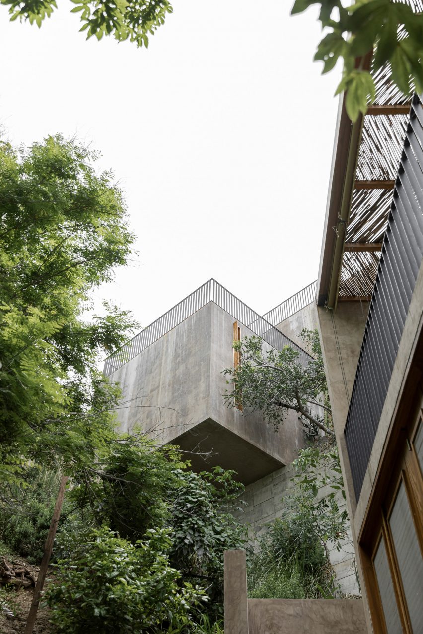 The architecture comprises stacked cubes