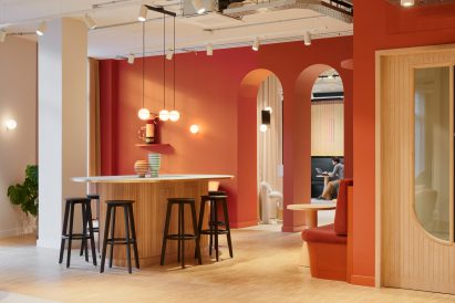 Terracotta walls and arched doorways in office