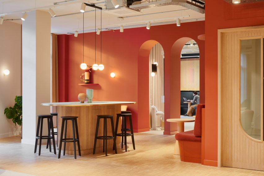 Terracotta walls and arched doorways in office
