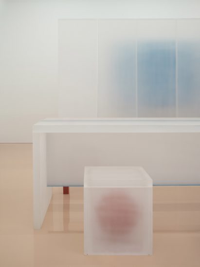 Steel-frame furniture wrapped in resin in Say Architects store interior
