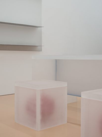Resin stool with red sphere at its centre in Lika Lab boutique