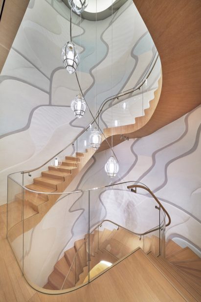 Sculptural glass and oak staircase