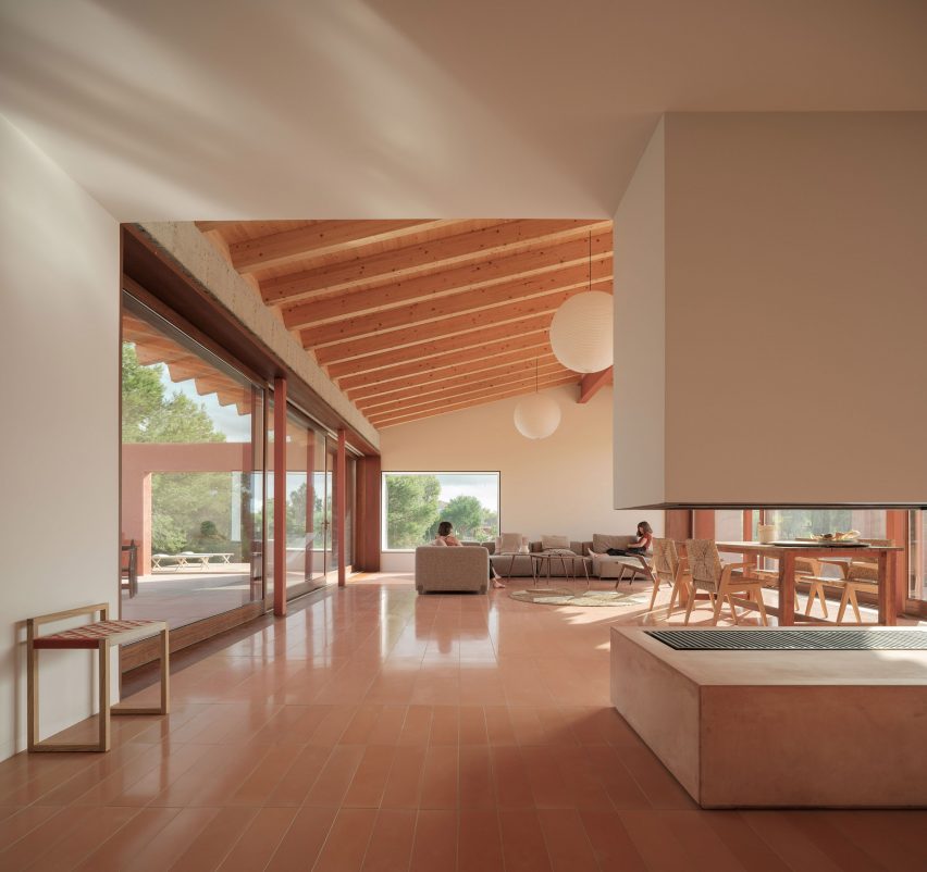 A holiday home living room with pink floor tiles