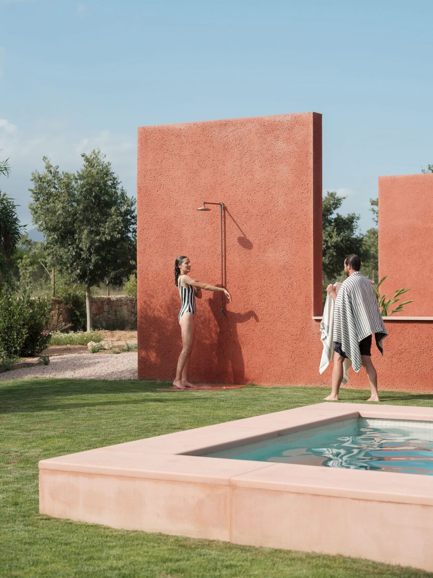 A private swimming pool and outdoor shower