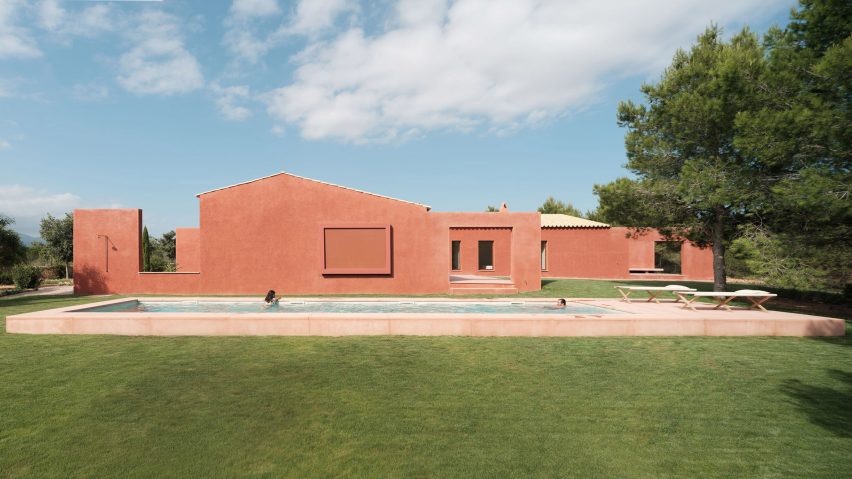 A Mallorcan holiday home with facades covered in red-coloured mortar
