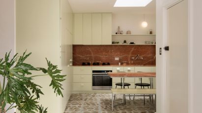Pistachio green kitchen and terrazzo tiles in Brunswick apartment by Murray Barker and Esther Stewart