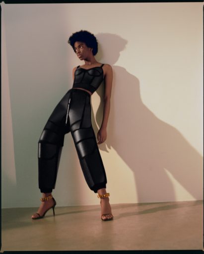 Full-body shot of model wearing mycelium leather clothing by Stella McCartney