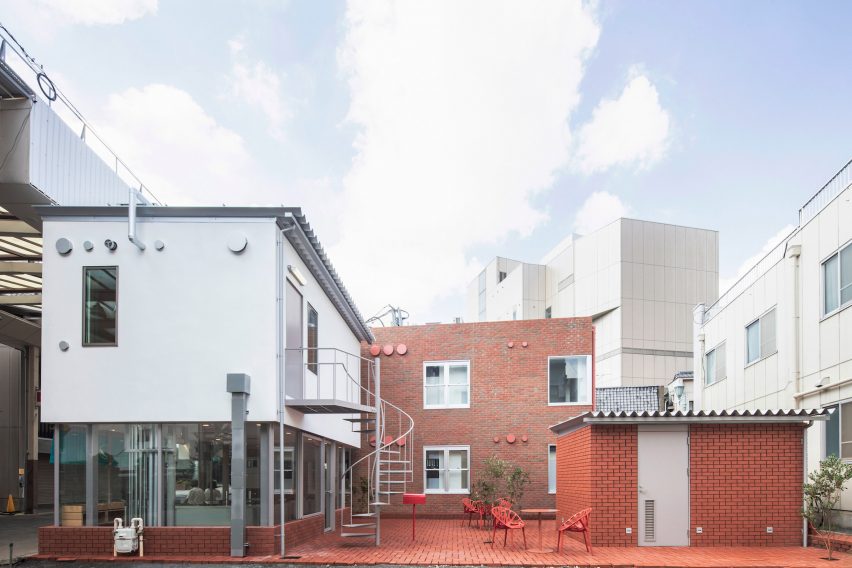 Brick-clad houses and brick courtyard