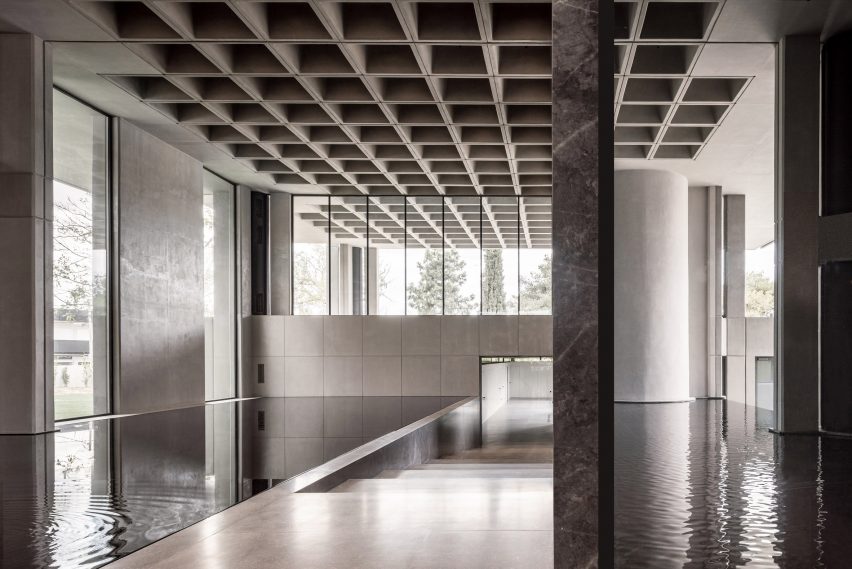 The concrete and marble entrance of an office