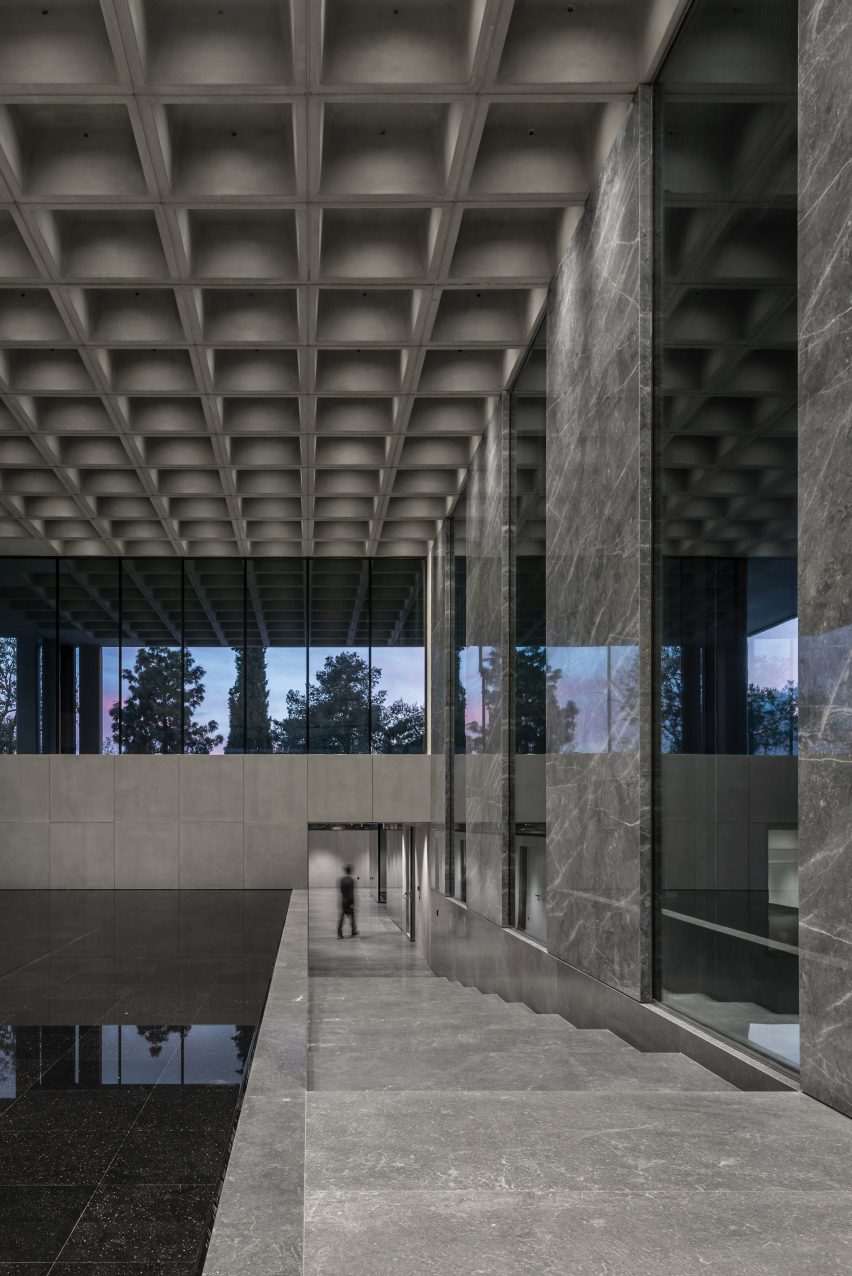 An office entrance with a waffle slab ceiling