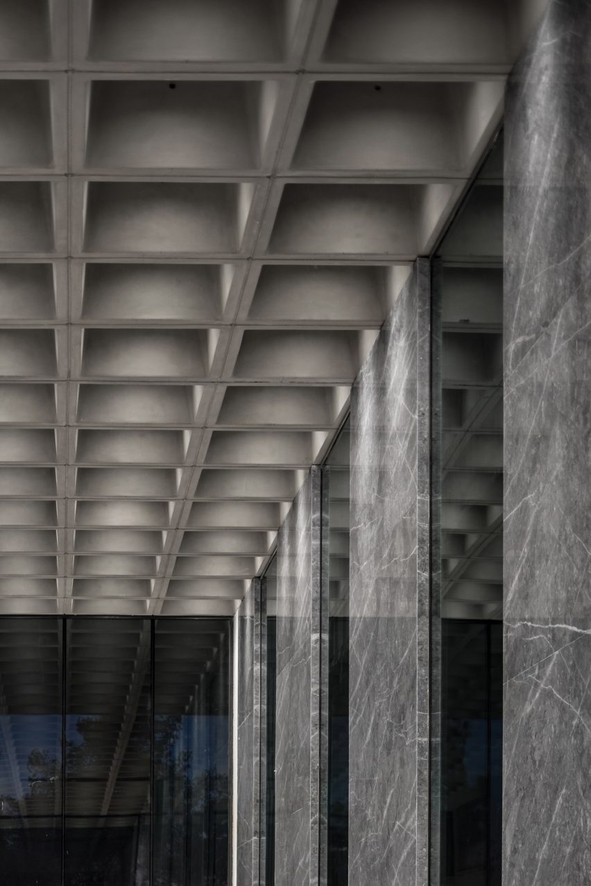An office entrance with a waffle slab ceiling