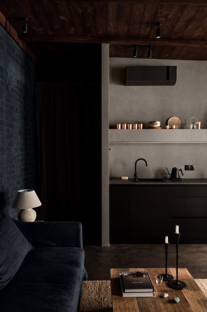 Open-plan lounge and kitchen in Kyiv apartment