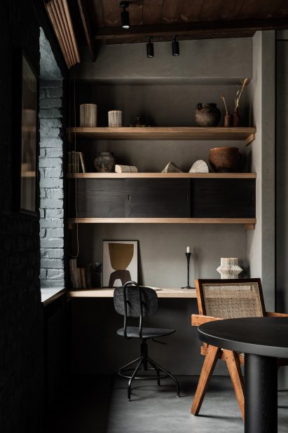 Dining table and home office with built-in storage in interior by Olga Fradina