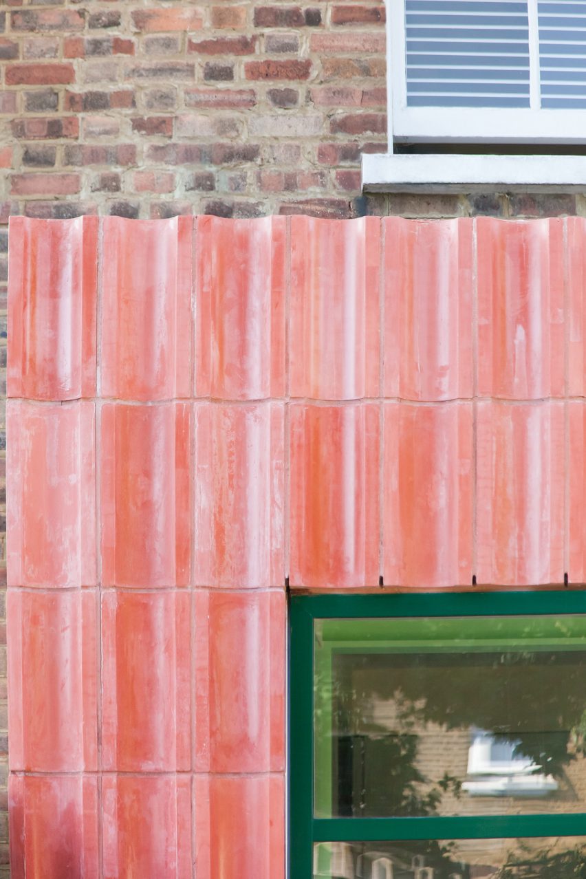 Pink concrete cladding on a house extension