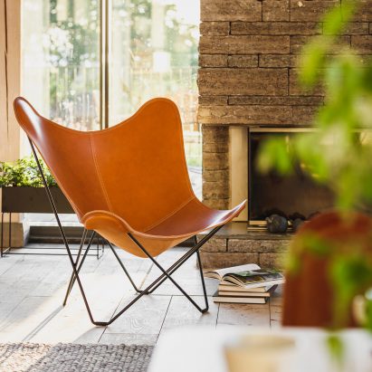 A leather butterfly chair by Cuero Design