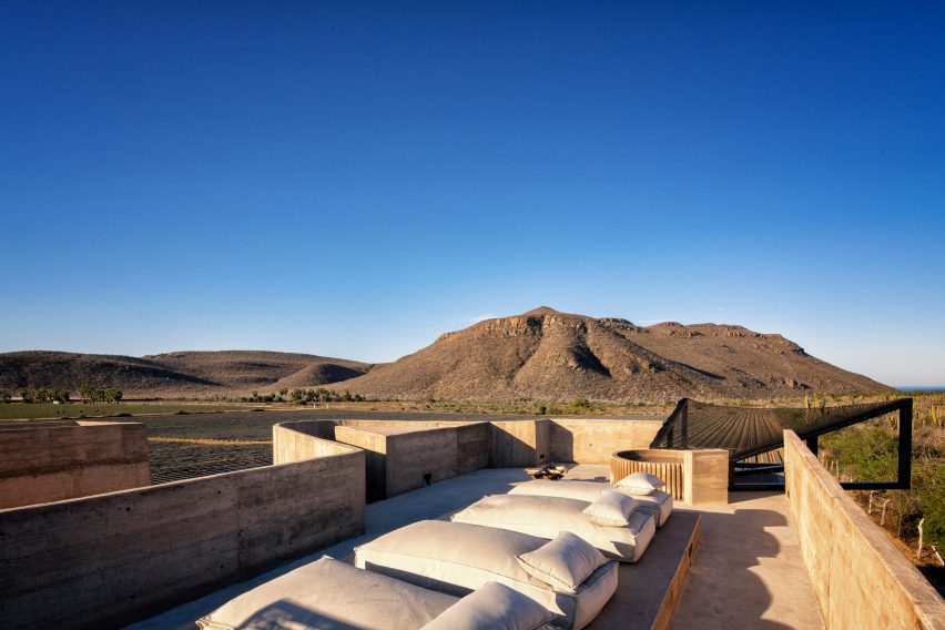 The hotel blends with the surrounding mountains