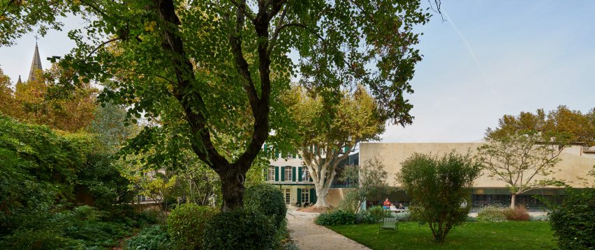 The library sits on lush grounds