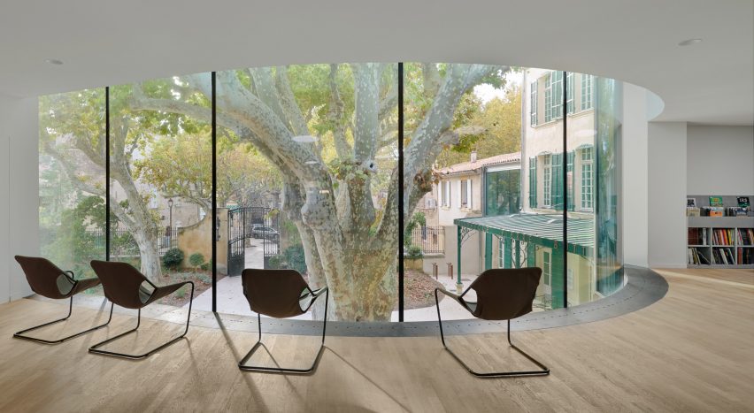 Chairs look out to the exterior