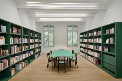 Green accents are applied to spaces in the manor