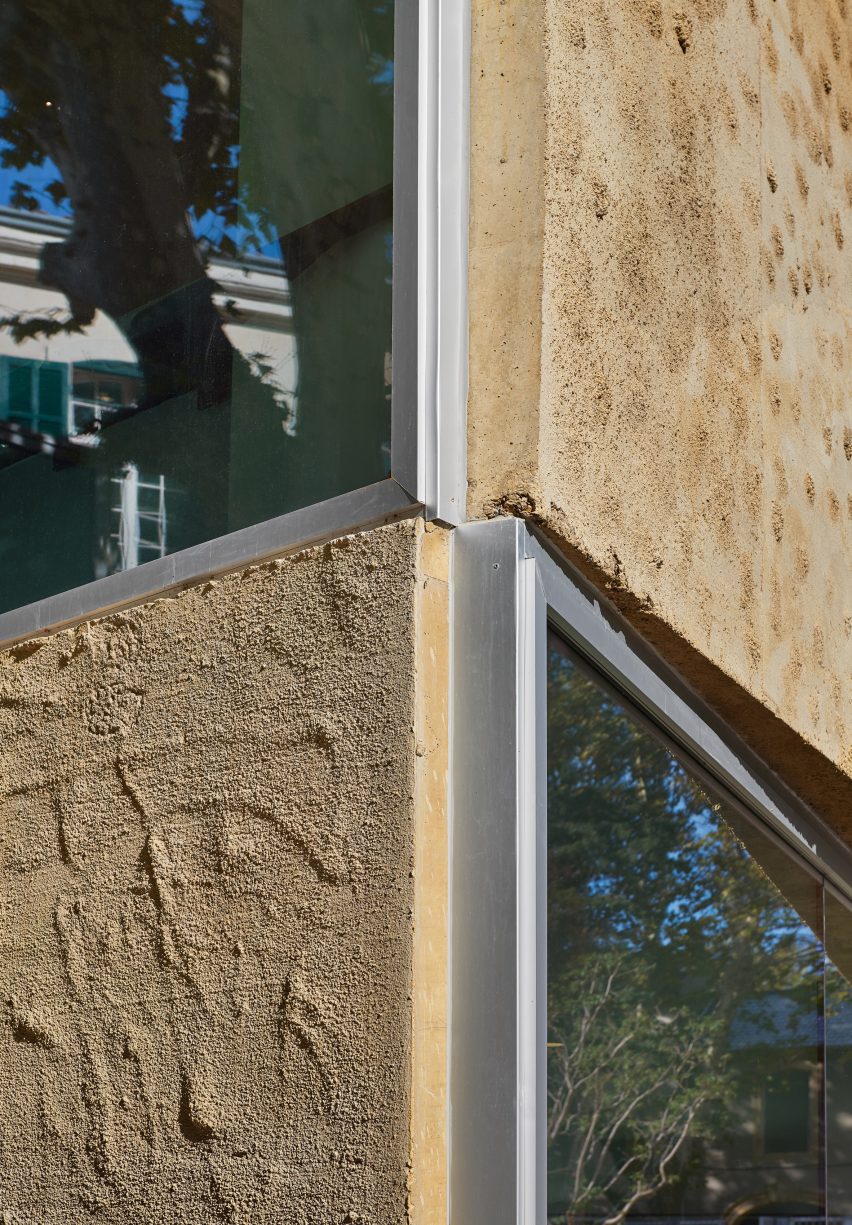 The facade has a rustic finish