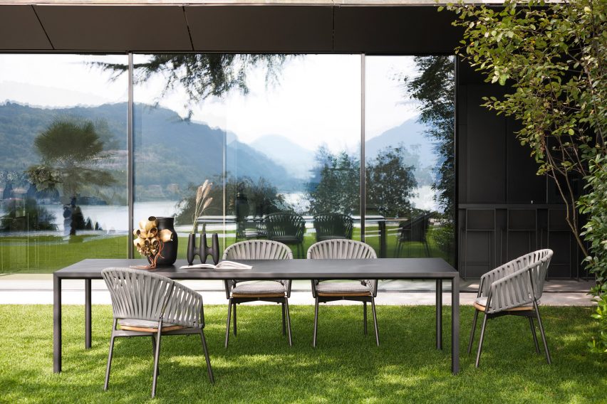 Table by Michael Anastassiades in dark smoke colour