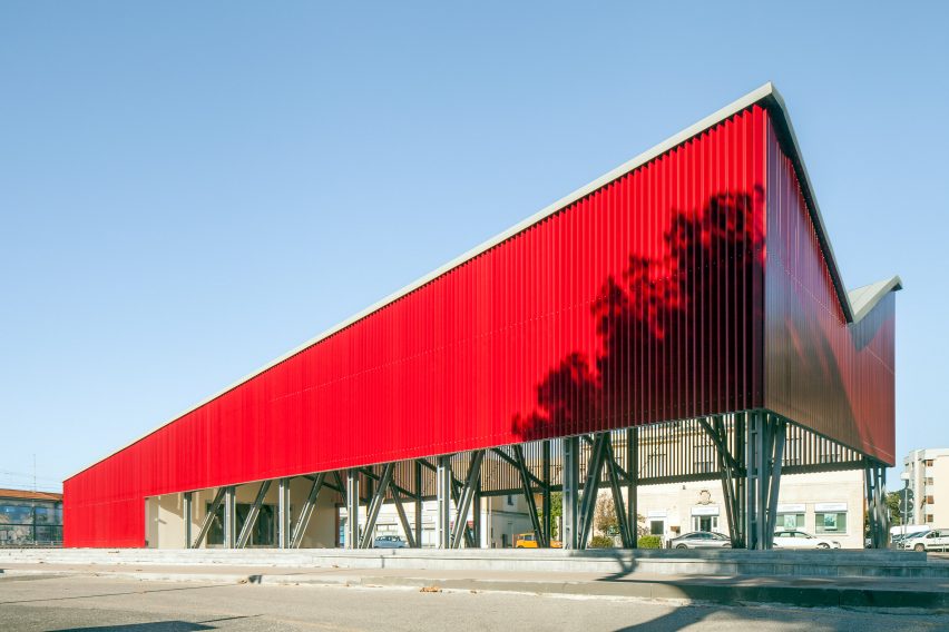 An angular red pavilion