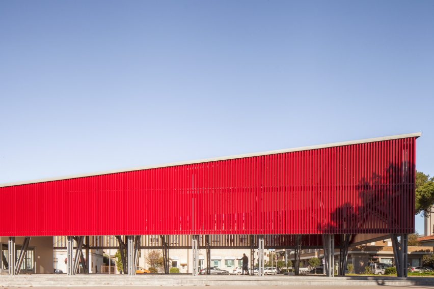 An angular red pavilion
