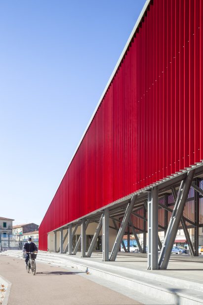 An angular red pavilion