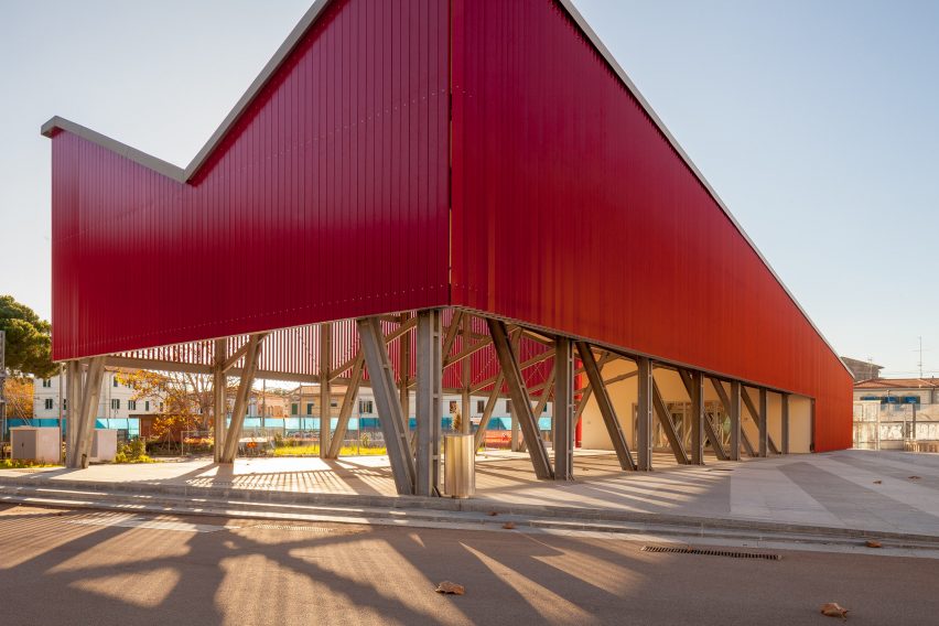 An angular red pavilion
