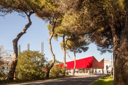 A Italian square with a red pavilion