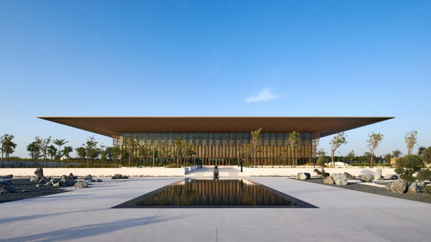 A library with a large overhanging roof in Sharjah