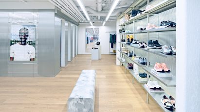 Steel and glass walls in Oslo retail interior by Snøhetta