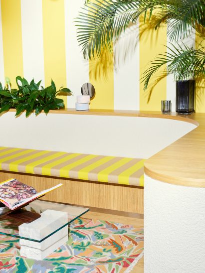Beige and white striped interior of Oslo store designed by Snøhetta