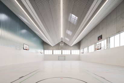Metal lattice sheets cover the ceilings of the interior