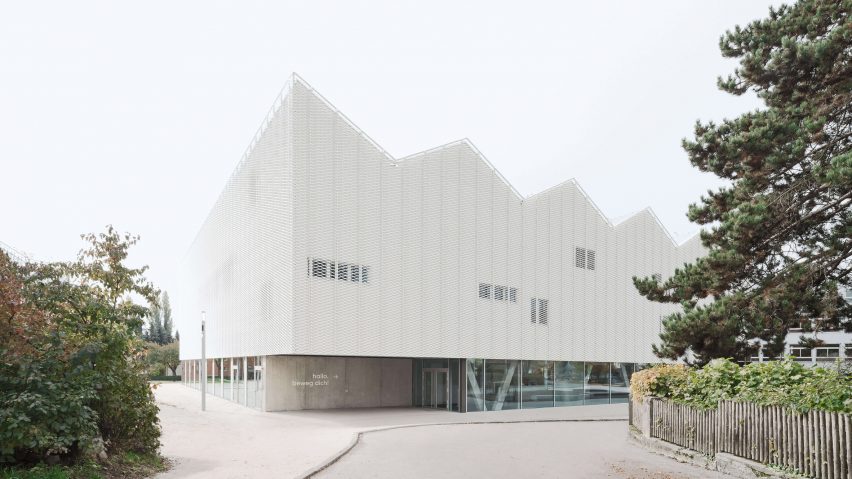 The building has a zigzag roof design