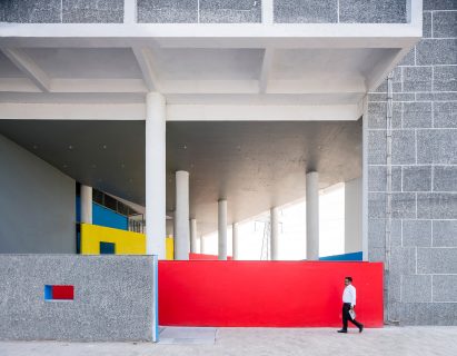 Block colour walls at student accommodation entrance