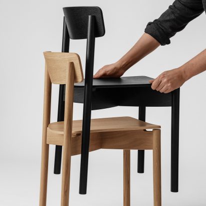 Two stacked Cross Chair by Takt
