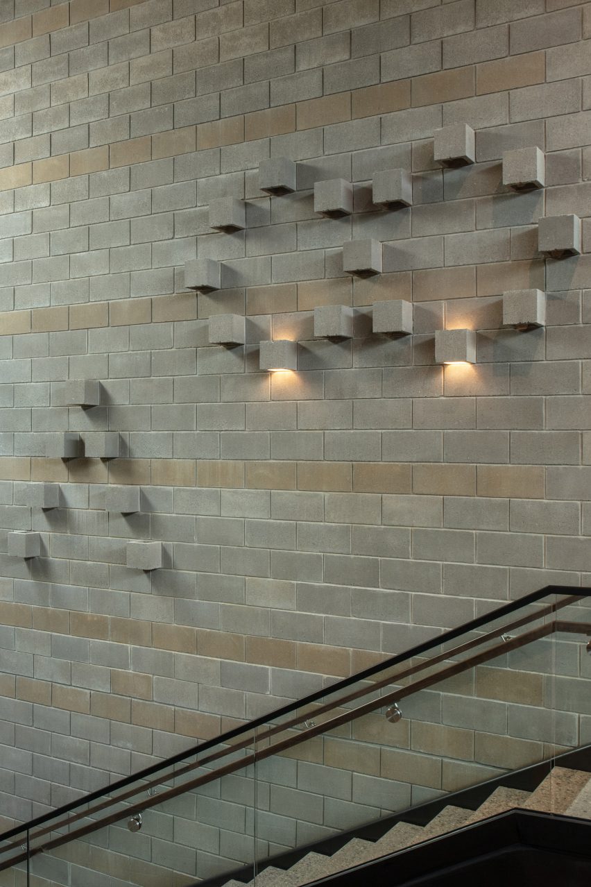 The walls are built to mimic striations in the landscape