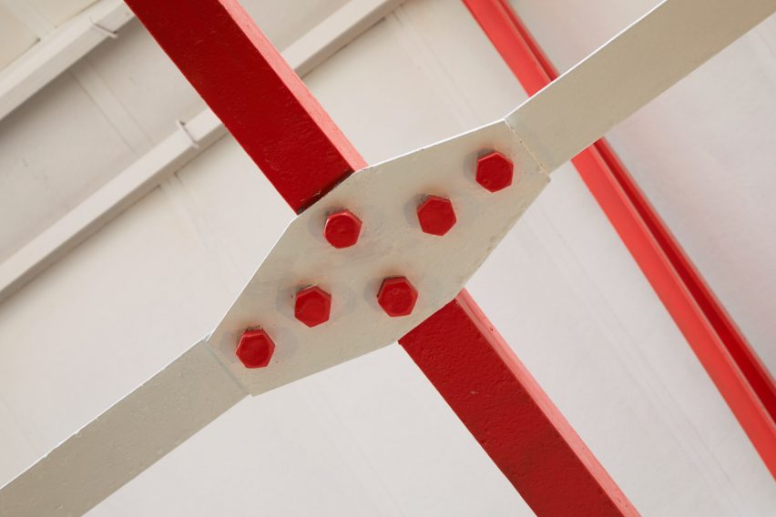 Exposed red-painted roof structure