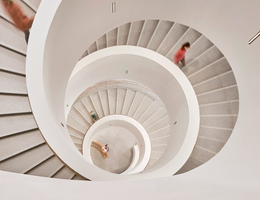 The Buddy Holly Hall's lobby has a white spiral staircase
