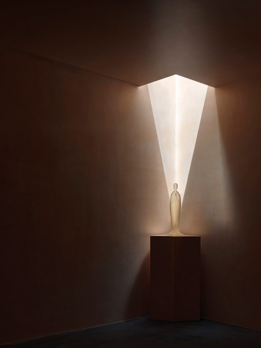 Buddha statue under spotlight