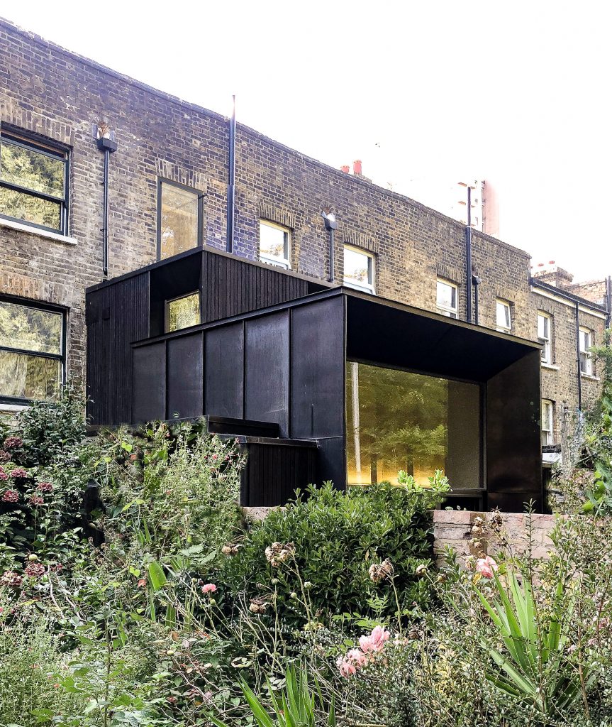 Black cubic extension to terraced house
