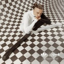 Tommy Cash wearing his bespoke Adidas Superstar trainers