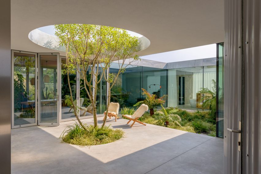 A courtyard within a Dutch house by Studioninedots