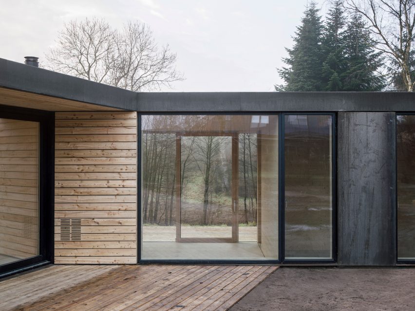 Steel-clad villa with wooden deck