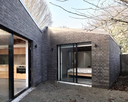 A London house clad in black brick