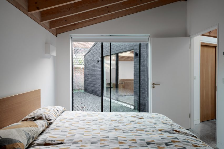 A white-walled bedroom