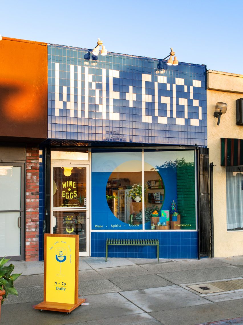 Blue and white tiled wine storefront